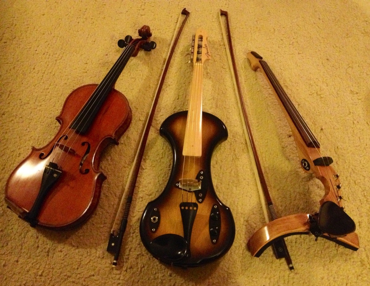 From left to right: Gand&Bernadel acoustic violin; 1958 Fender Electric Violin to custom build ART-VF4 violin